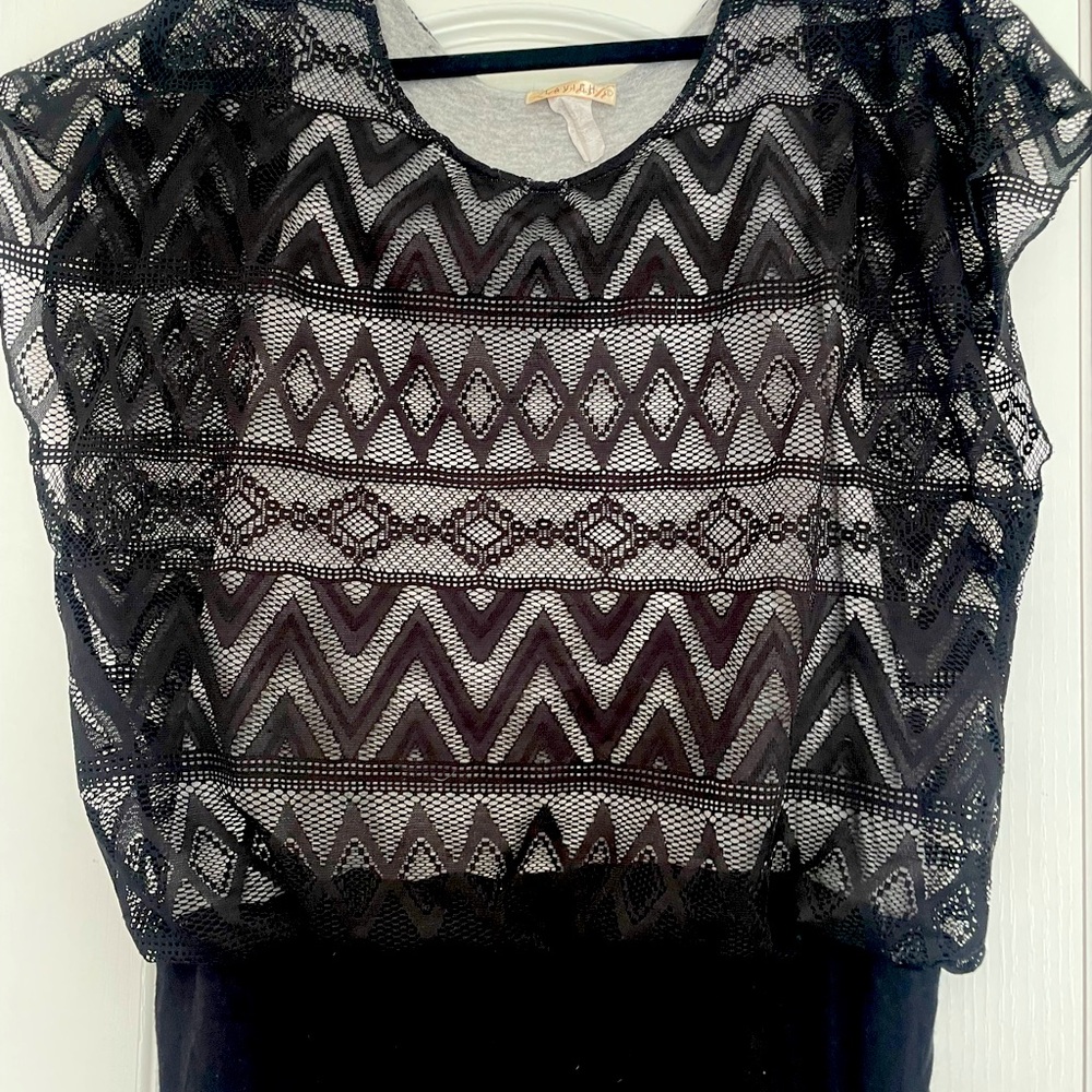 Black short sleeve patterned women’s shirt